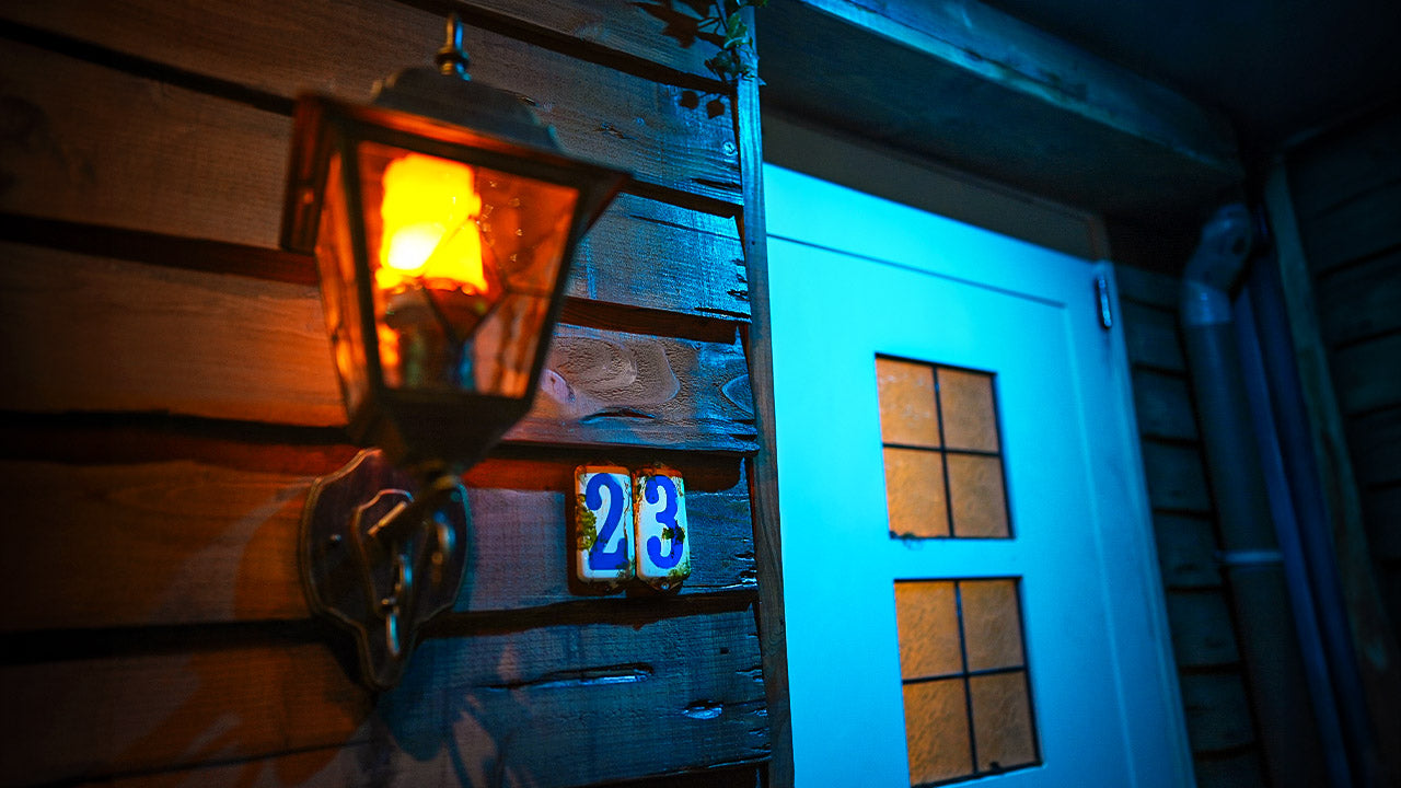 Handmade diorama with a wooden tree and blue lighting in escape room House of Nowhere in Houten